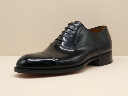 Bespoke Classic English Cap Toe Oxford, crafted from premium German box calf leather and finished with a hand-stitched, veg-tanned sole by euGo, The Art of Shoemaking, Burlingame, California.