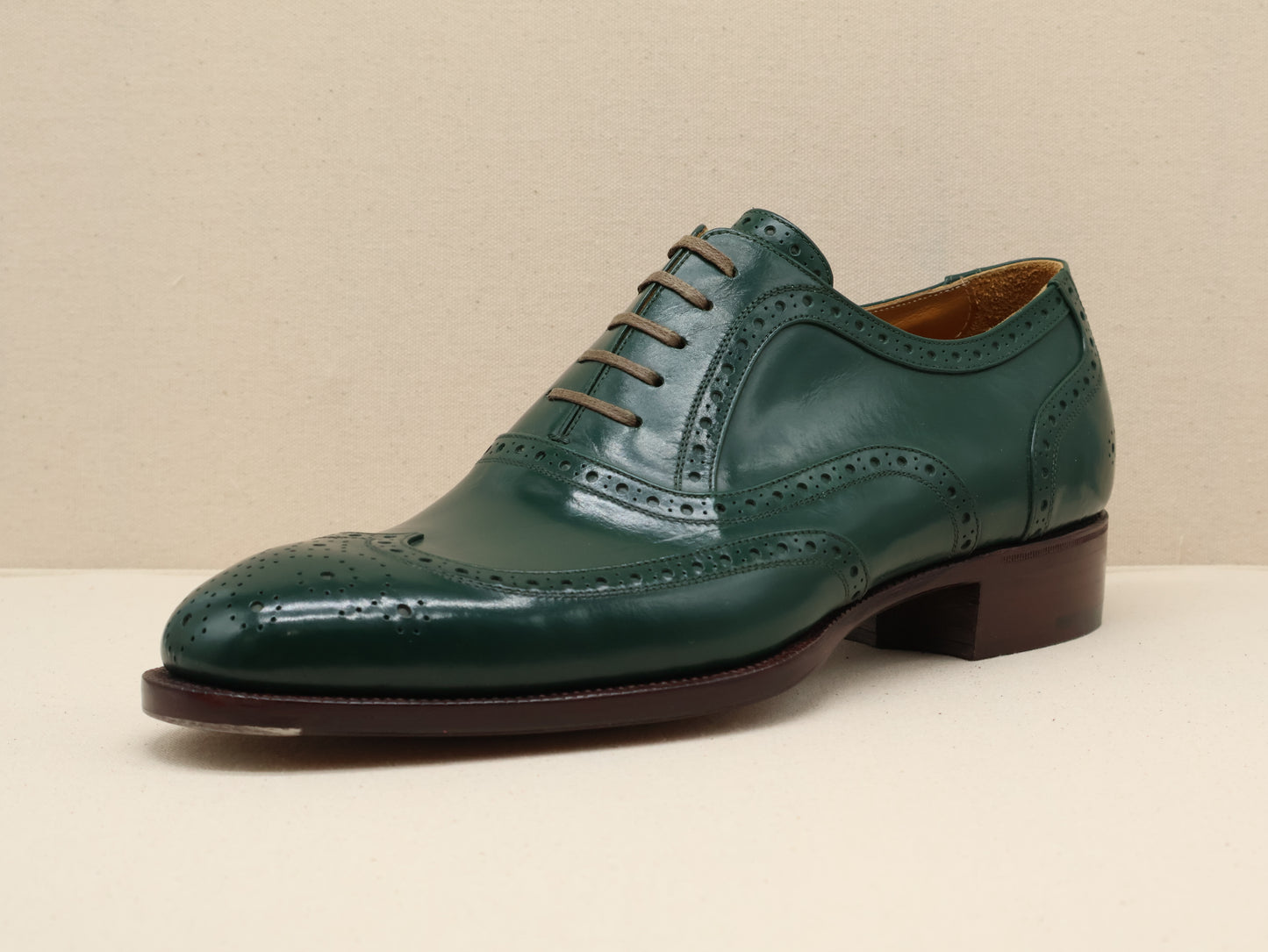 Bespoke Full-Brogue Classic Oxford, handcrafted from the finest French box calf leather, featuring a classic French toe shape and a rich Irish green patina. Finished with a Goodyear-welted leather sole by euGo, The Art of Shoemaking, Burlingame, California.